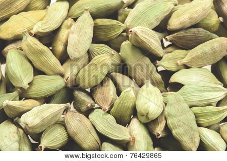 Green cardamom pods close-up. Macro photo