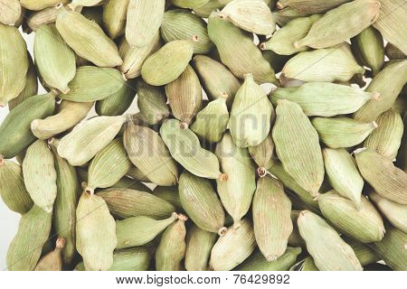 Green cardamom pods close-up. Macro photo