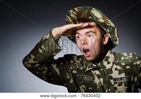 Funny soldier in military concept