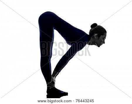 woman exercising Ardha Uttanasana standing half forward bend pose yoga silhouette shadow white background