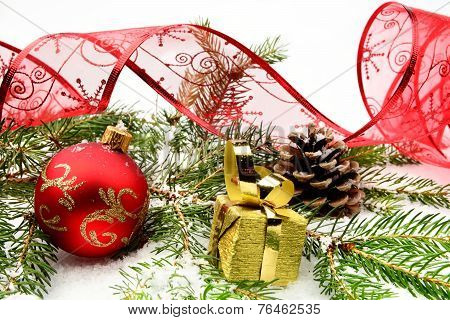 Golden Christmas Gifts,baubles With Red Ribbon And Needles Fir O