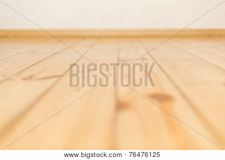 Warm wooden floor made of planks side by side
