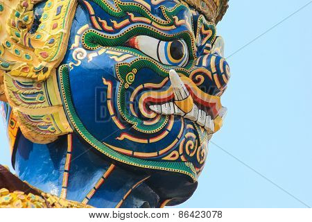 Closeup Face Giant Statue At Temple Of The Emerald Buddha