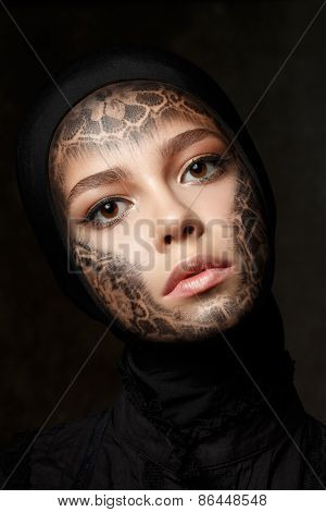 Young Beautiful Woman With Faceart