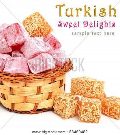 Turkish Sweet Delights In Icing Sugar In The Basket Isolated On White
