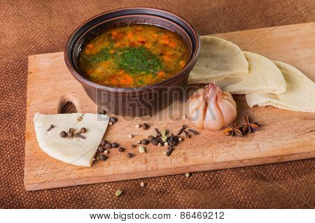 Soup with bread.