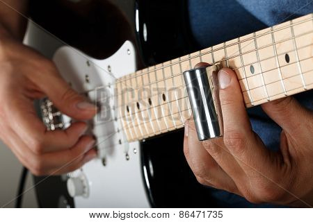 Electric Guitar Player Performing Song