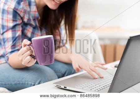 Close Up Of A Woman Hands Typing In A Laptop
