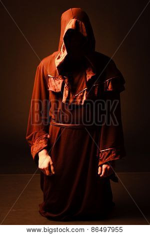 mysterious Catholic monk. studio shot