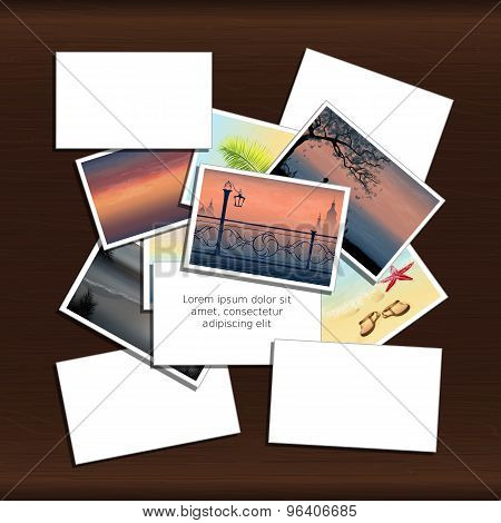 Stack of photos on wood background with place for inscription