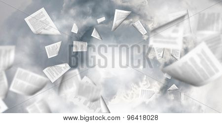 Conceptual image with business items flying in air
