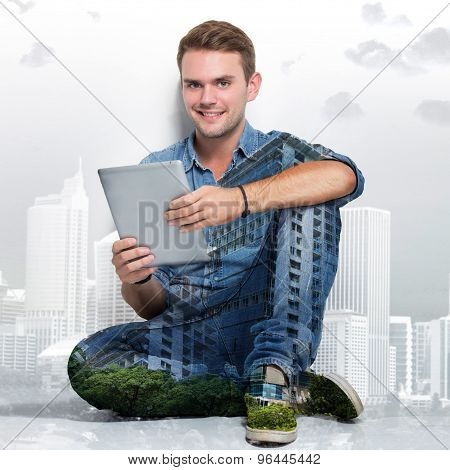 Young Caucasian Man Sitting On The Floor Holding A Tablet Pc. Multi Exposure Photo