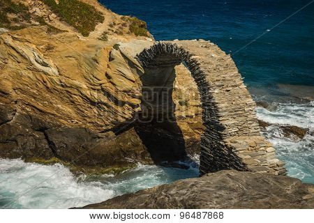 Ancient Bridge To Small Island Near The Town Of Andros, Andros, Greece