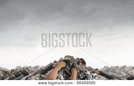 Close up of woman legs standing on the edge of rock