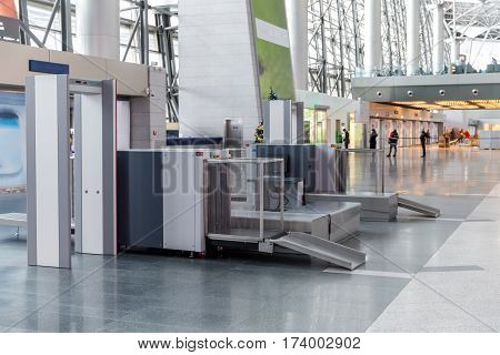 Airport security check point with metal detector and X ray scaner
