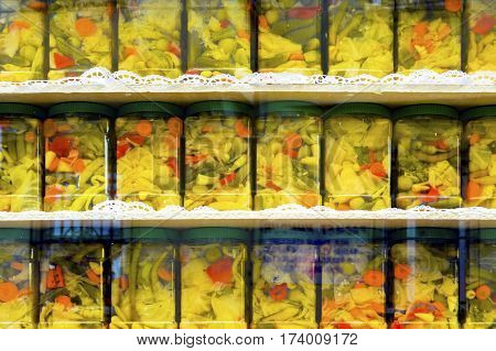 Tursu Turkish pickled vegetables and fruits neatly arranged in jars in a market in Istanbul Turkey