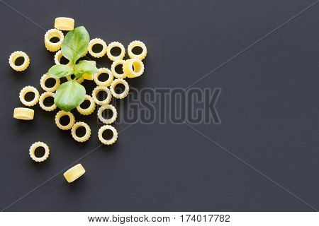 Pasta Rings On A Black Background