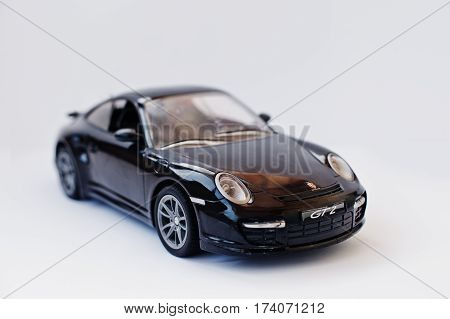 Hai, Ukraine - March 1, 2017: Mini Copy Of Toy Car Porsche Gt2 Isolated On White Background.