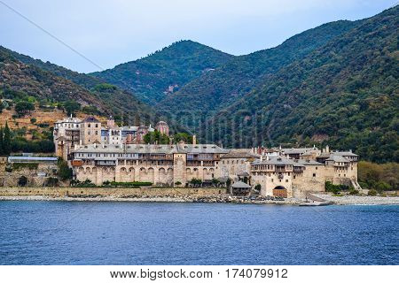 Orthodox Greek monastery on Mount Athos. View from sea. Xenophon.