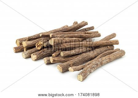 Liqorice roots on white background. Biological food