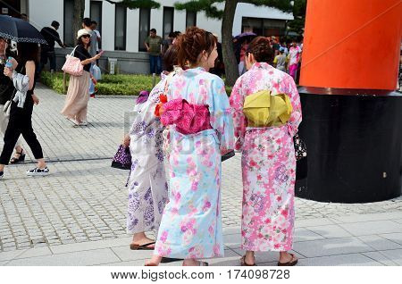 Japanese Women Wear Traditional Japanese Clothing (kimono And Yukatas)
