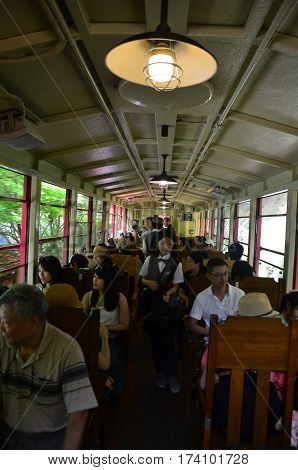 Japanese People And Traveler Foreigner Tour On Sagano Scenic Railway For Looking View Of Hozugawa Ri