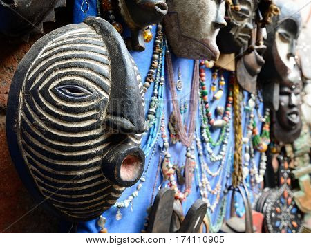 Decorative elements on the souk (market) in the old town Medina in Morocco. Traditional mask