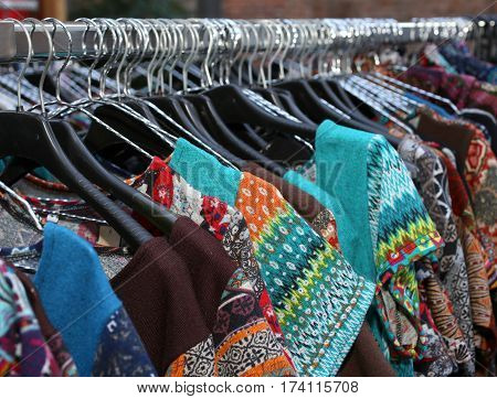 Many Vintage Clothes Hanging For Sale