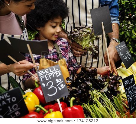 Little Boy Selling Vegetable at Market