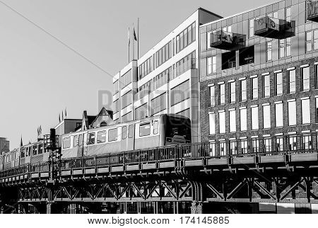 Subway Train On A Bridge In Monochrome