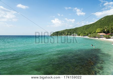 The sea and the beach on a Sunny day.