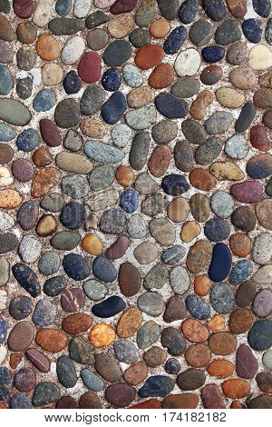 Cobblestones in a pavement walkway, small focus