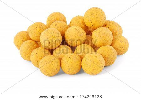 Yellow boilies carp fishing baits isolated on white background with soft shadow