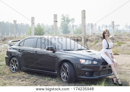 Beautiful Girl Detective Near The Sports Car.
