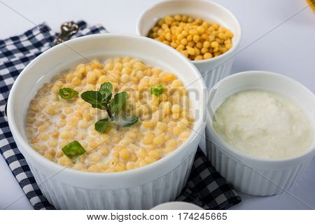 Dahi Bundi or Boondi Raita, favourite indian started or side dish made using Rajasthani snack food made from sweetened, fried chickpea flour, called Boondi with sweet and salty curd or buttermilk