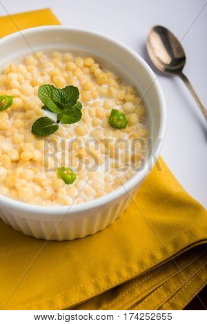 Dahi Bundi or Boondi Raita, favourite indian started or side dish made using Rajasthani snack food made from sweetened, fried chickpea flour, called Boondi with sweet and salty curd or buttermilk