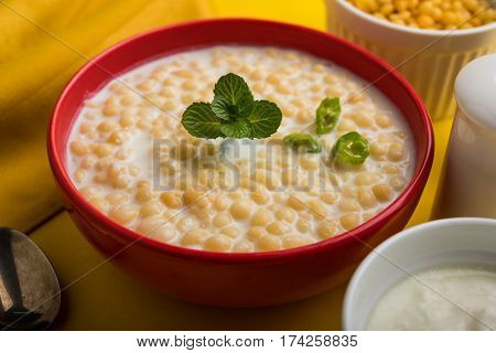 Dahi Bundi or Boondi Raita, favourite indian started or side dish made using Rajasthani snack food made from sweetened, fried chickpea flour, called Boondi with sweet and salty curd or buttermilk