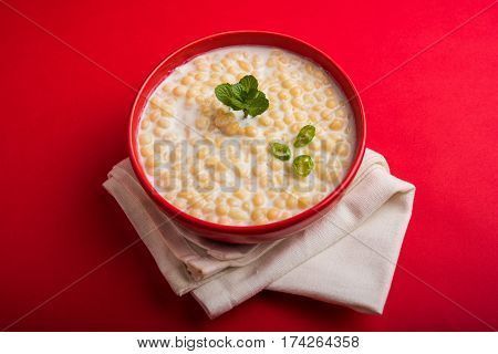 Dahi Bundi or Boondi Raita, favourite indian started or side dish made using Rajasthani snack food made from sweetened, fried chickpea flour, called Boondi with sweet and salty curd or buttermilk