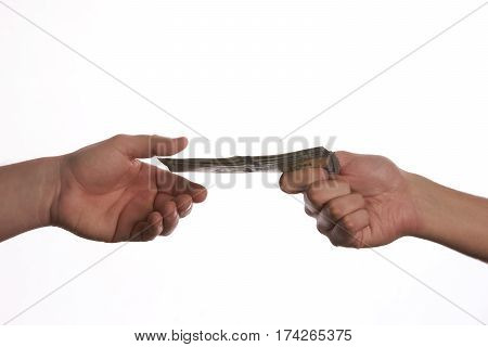 Close-up Of Person Hand Giving US dollar banknote money. Сoncept of salary.