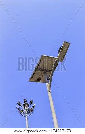 solar pannel and LED street lamp pole on blue sky