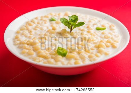 Dahi Bundi or Boondi Raita, favourite indian started or side dish made using Rajasthani snack food made from sweetened, fried chickpea flour, called Boondi with sweet and salty curd or buttermilk
