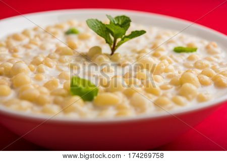 Dahi Bundi or Boondi Raita, favourite indian started or side dish made using Rajasthani snack food made from sweetened, fried chickpea flour, called Boondi with sweet and salty curd or buttermilk