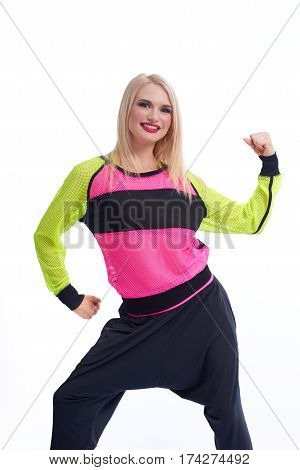She can do it. Studio portrait of a cheerful red lipped sporty female flexing her arms muscles posing powerfully power strength active vitality sport concept isolated