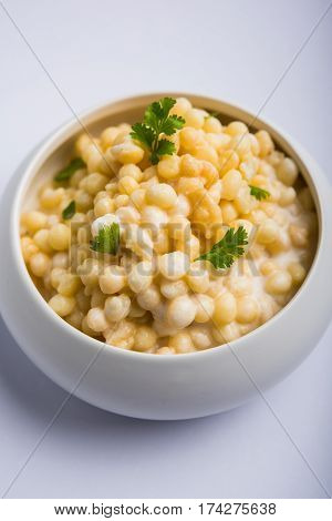 Dahi Bundi or Boondi Raita, favourite indian started or side dish made using Rajasthani snack food made from sweetened, fried chickpea flour, called Boondi with sweet and salty curd or buttermilk