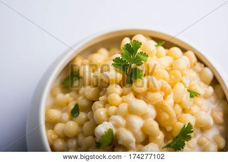 Dahi Bundi or Boondi Raita, favourite indian started or side dish made using Rajasthani snack food made from sweetened, fried chickpea flour, called Boondi with sweet and salty curd or buttermilk