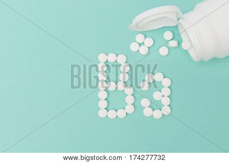 Bottle With Vitamin B3 Pills Forming The Word 'b3'