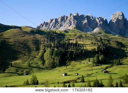 view of dolomites mountains in italy on a blue sky background