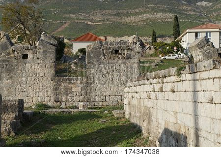 Ruins of ancient roman town Salona near Split, Dalmatia, Croatia in evening dusk