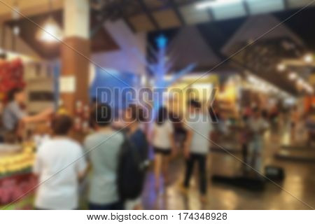 blurred photo Blurry image People walk at the Night Plaza