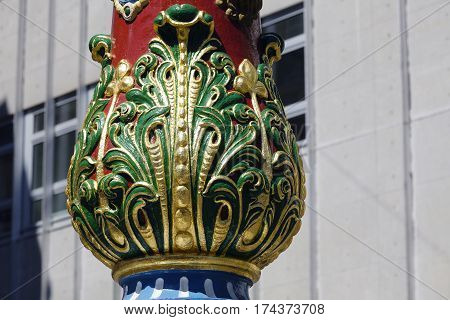 LUCERNE SWITZERLAND - MAY 06 2016: Colorful detail that is a part of a pillar of Fritschi Fountain in Gothic style . A variety of fountains is a great tourist attraction in the City